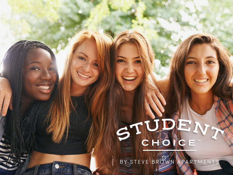 4 ladies with student choice logo